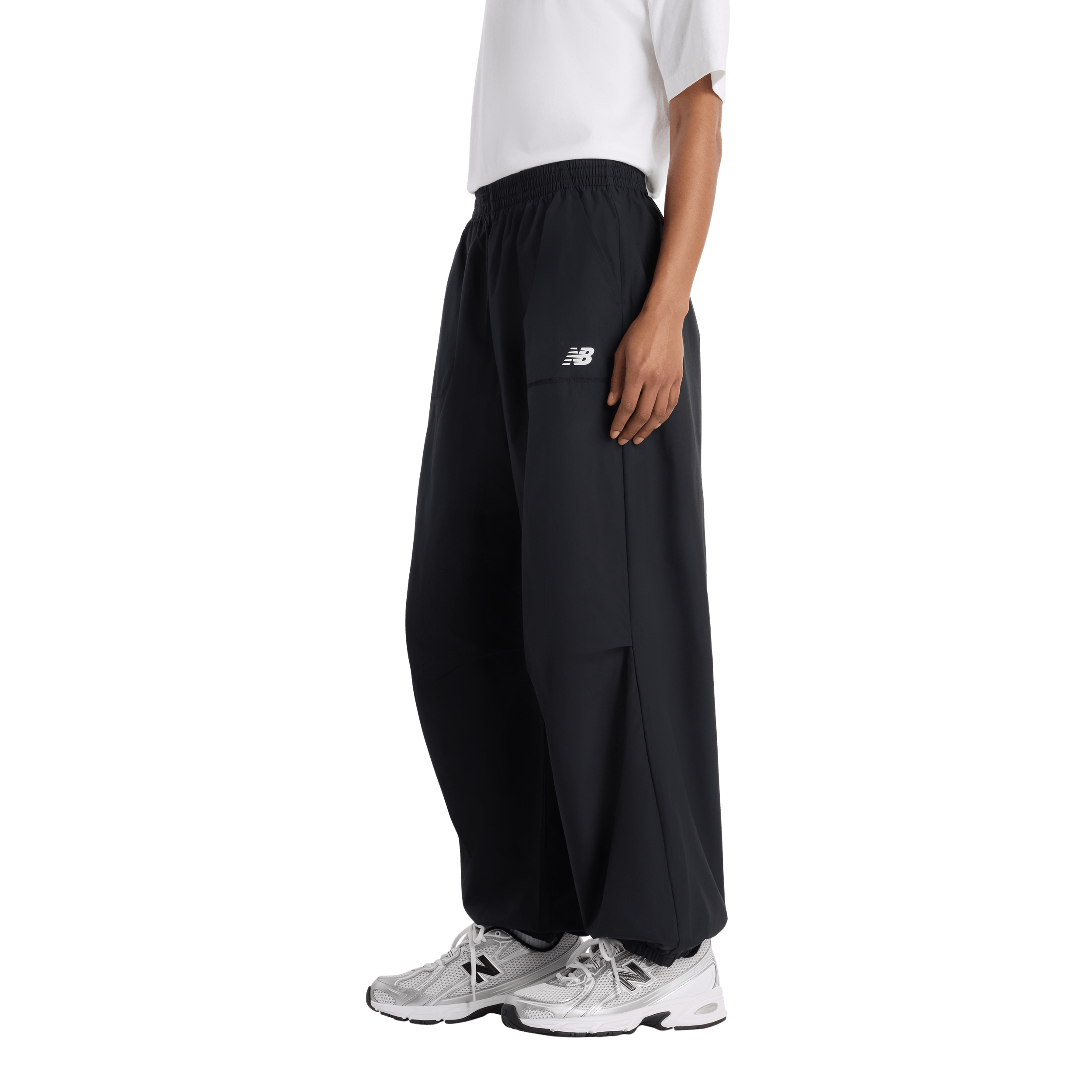 PANTALON NEW BALANCE TRACKSIDE WOVEN PANT MUJER